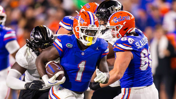 Florida Gators running back Montrell Johnson Jr. (1) breaks through a hole during the first half at Ben Hill Griffin Stadium in Gainesville, FL on Saturday, October 5, 2024. [Doug Engle/Gainesville Sun]