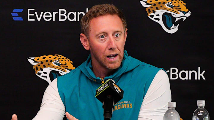 Jaguars General Manager James Gladstone, left listens as head coach Liam Coen talks about the upcoming NFL draft during the Jacksonville Jaguars’ annual pre-draft luncheon press conference in the media room at the Miller Electric Center Thursday April 9, 2026 in Jacksonville, Fla. [Doug Engle/Florida Times-Union]