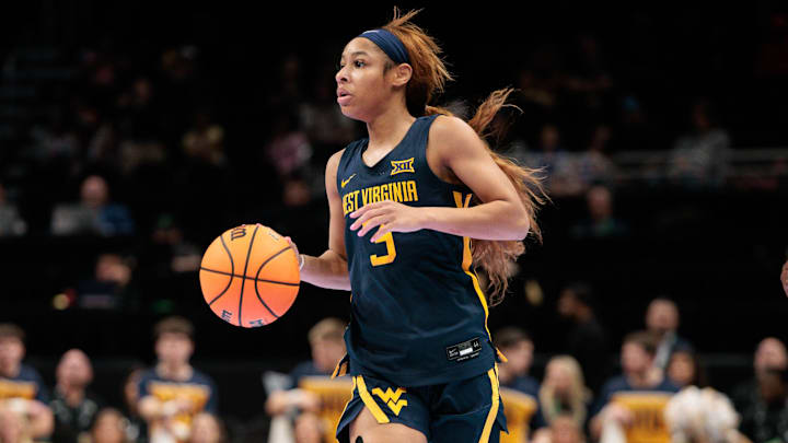 Mar 8, 2026; Kansas City, MO, USA; West Virginia Mountaineers guard Gia Cooke (3) brings the ball up court during the first half against the TCU Horned Frogs at T-Mobile Center. Mandatory Credit: William Purnell-Imagn Images Mar 8, 2026; Kansas City, MO, USA; West Virginia Mountaineers guard Gia Cooke (3) brings the ball up court during the first half against the TCU Horned Frogs at T-Mobile Center. Mandatory Credit: William Purnell-Imagn Images