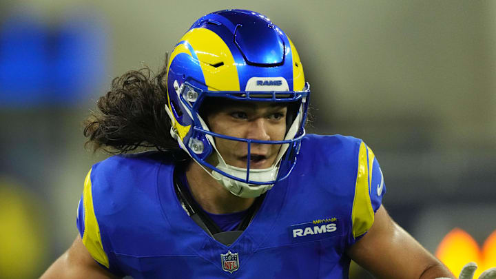 Nov 11, 2024; Inglewood, California, USA; Los Angeles Rams wide receiver Puka Nacua (17) carries the ball against the Miami Dolphins at SoFi Stadium. Mandatory Credit: Kirby Lee-Imagn Images