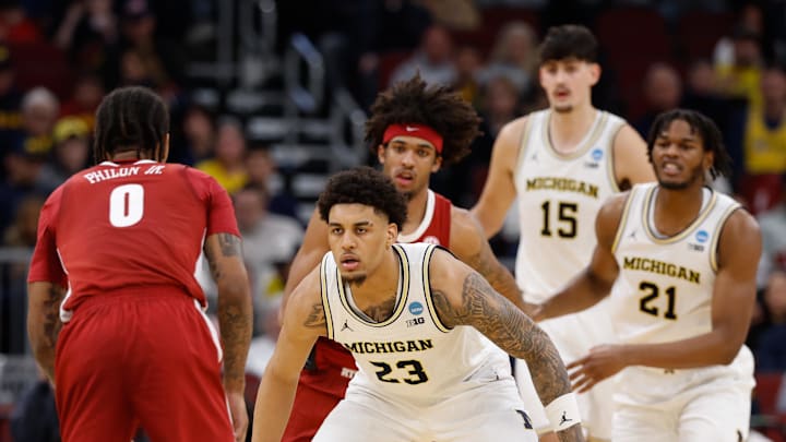 Mar 27, 2026; Chicago, IL, USA; Michigan Wolverines forward Yaxel Lendeborg (23) defends Alabama Crimson Tide guard Labaron Philon Jr. (0) in the second half during a Sweet Sixteen game of the Midwest Regional of the men's 2026 NCAA Tournament at United Center. Mandatory Credit: Kamil Krzaczynski-Imagn Images