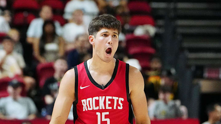 Jul 14, 2024; Las Vegas, NV, USA; Houston Rockets guard Reed Sheppard (15) reacts after scoring against the Washington Wizards during the third quarter at Thomas & Mack Center. Mandatory Credit: Stephen R. Sylvanie-Imagn Images