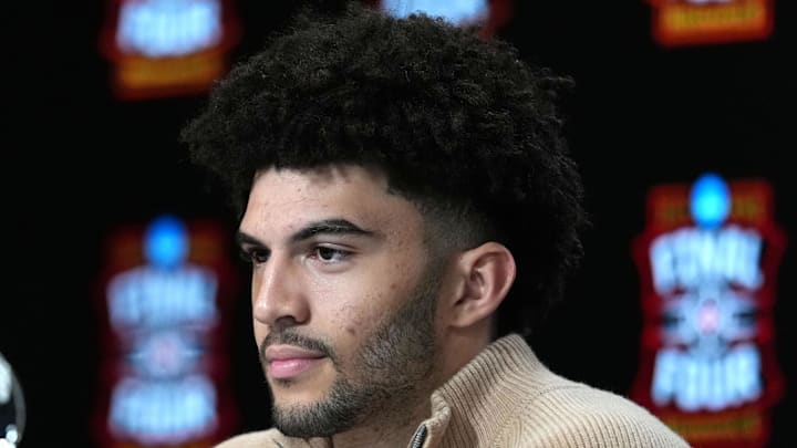 Apr 4, 2026; Indianapolis, IN, USA; Duke Blue Devils forward Cameron Boozer is awarded the Oscar Robertson Player of the Year Award presented by the US Basketball Writers Association and the Associated Press during the men's 2026 NCAA Tournament at Lucas Oil Stadium. Mandatory Credit: Bob Donnan-Imagn Images