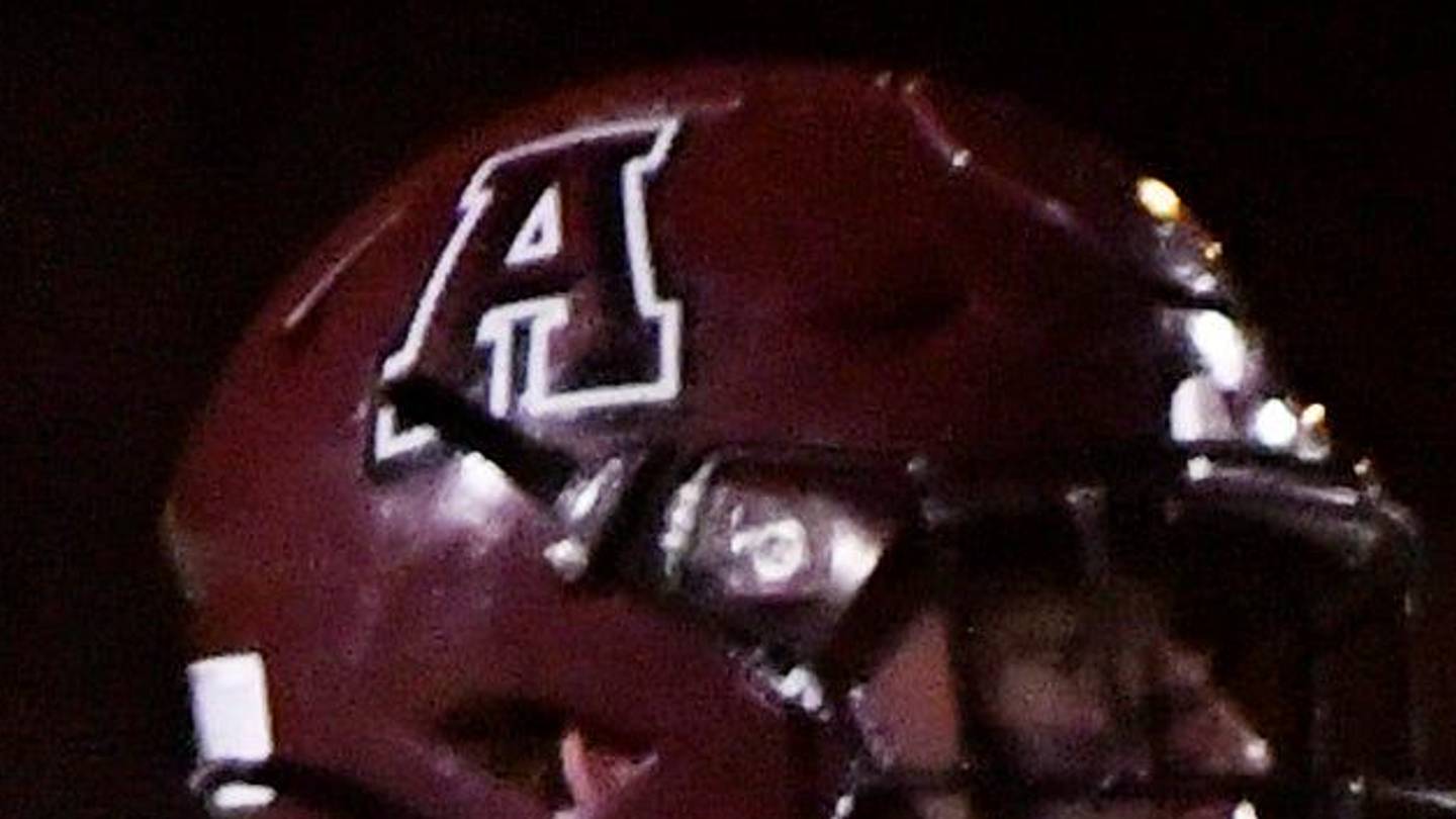 blue football helmet with black and chrome g Riddell Axiom football helmet