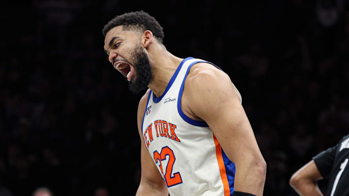 Mar 20, 2026; Brooklyn, New York, USA; New York Knicks center Karl-Anthony Towns (32) reacts after a basket during the first half against the Brooklyn Nets at Barclays Center. Mandatory Credit: Vincent Carchietta-Imagn Images