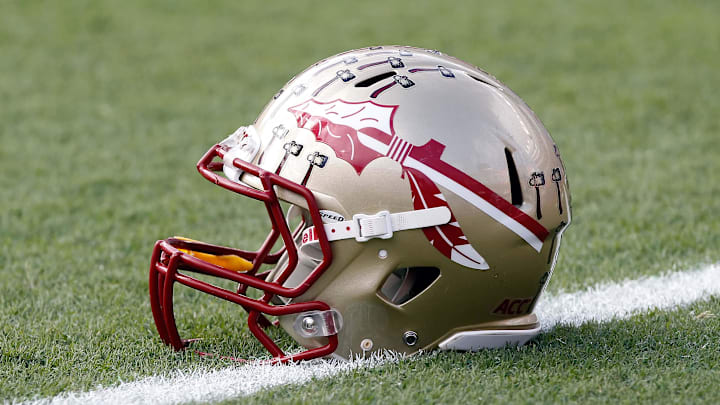 Nov 30, 2013; Gainesville, FL, USA; Florida State Seminoles helmet on the field prior to the game against the Florida Gators at Ben Hill Griffin Stadium. Mandatory Credit: Kim Klement-Imagn Images Nov 30, 2013; Gainesville, FL, USA; Florida State Seminoles helmet on the field prior to the game against the Florida Gators at Ben Hill Griffin Stadium. Mandatory Credit: Kim Klement-Imagn Images