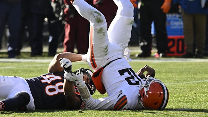 Dec 14, 2025; Chicago, Illinois, USA; Chicago Bears linebacker D'Marco Jackson (48) sacks Cleveland Browns quarterback Shedeur Sanders (12) during the second quarter at Soldier Field. Mandatory Credit: Matt Marton-Imagn Images Dec 14, 2025; Chicago, Illinois, USA; Chicago Bears linebacker D'Marco Jackson (48) sacks Cleveland Browns quarterback Shedeur Sanders (12) during the second quarter at Soldier Field. Mandatory Credit: Matt Marton-Imagn Images