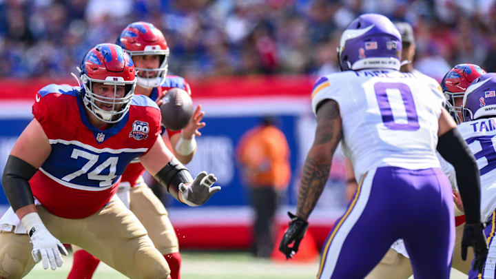 Sep 8, 2024; East Rutherford, New Jersey, USA; New York Giants guard Greg Van Roten (74) pass protects against Minnesota Vikings linebacker Ivan Pace Jr. (0) during the second half at MetLife Stadium.