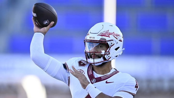 Florida State quarterback DJ Uiagalelei warms up before a game.