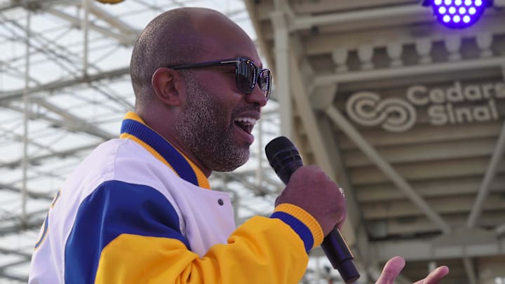 Sep 12, 2021; Inglewood, California, USA; Torry Holt speaks at the Countdown to Kickoff show at American Airlines plaza at SoFi Stadium. Mandatory Credit: Kirby Lee-Imagn Images