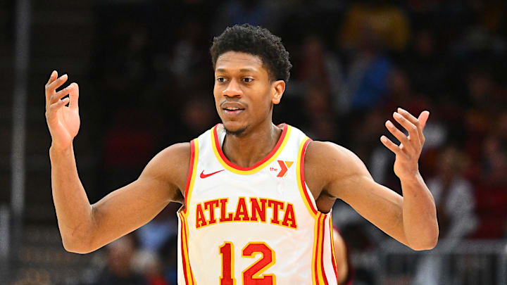 De'Andre Hunter #12 of the Atlanta Hawks reacts against the Cleveland Cavaliers.