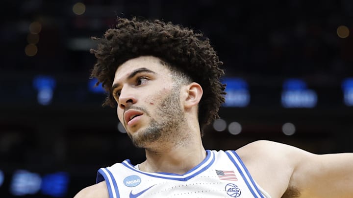 Mar 29, 2026; Washington, DC, USA; Duke Blue Devils forward Cameron Boozer (12) grabs the ball in front of UConn Huskies forward Jaylin Stewart (3) in the first half during an Elite Eight game of the East Regional of the men's 2026 NCAA Tournament at Capital One Arena. Mandatory Credit: Amber Searls-Imagn Images