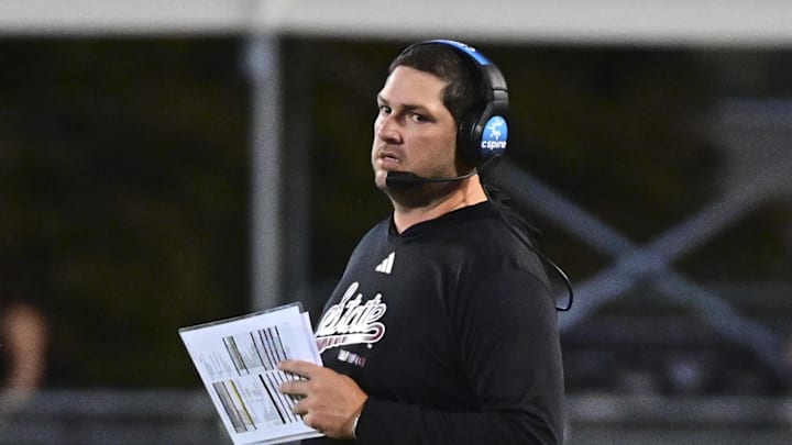 Mississippi State Bulldogs coach Jeff Lebby walks onto the field during a time out during the second quarter of the game against the Toledo Rockets at Davis Wade Stadium at Scott Field.