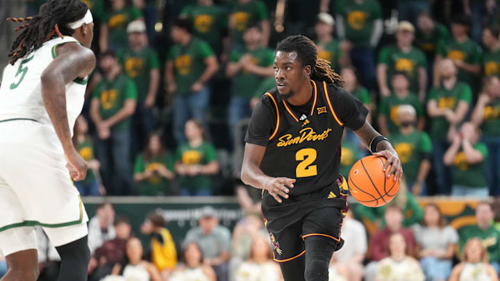 Feb 21, 2026; Waco, Texas, USA; Arizona State Sun Devils guard Anthony Johnson (2) controls the ball as Baylor Bears guard Obi Agbim (5) defends during the first half at Paul and Alejandra Foster Pavilion. Mandatory Credit: Chris Jones-Imagn Images Feb 21, 2026; Waco, Texas, USA; Arizona State Sun Devils guard Anthony Johnson (2) controls the ball as Baylor Bears guard Obi Agbim (5) defends during the first half at Paul and Alejandra Foster Pavilion. Mandatory Credit: Chris Jones-Imagn Images