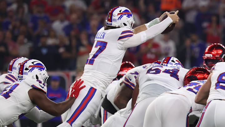 Nov 20, 2025; Houston, Texas, USA; Buffalo Bills quarterback Josh Allen (17) dives for a first down against the Houston Texans in the first quarter at NRG Stadium.