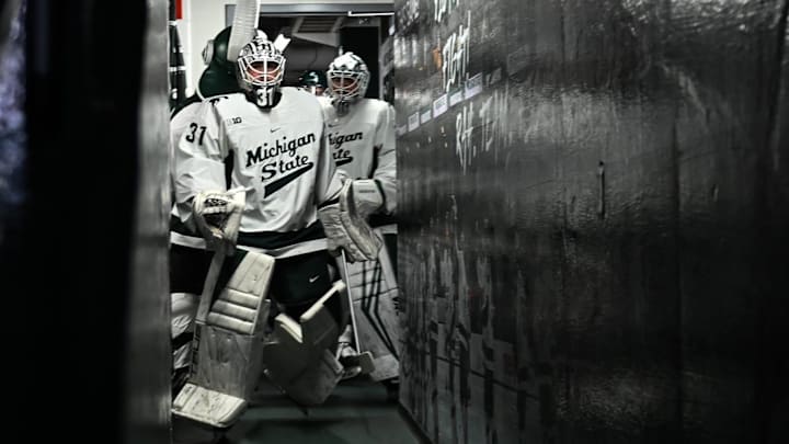 Michigan State goalie Luca Di Pasquo prepares to head out on the ice, Thursday, Jan. 2, 2024, before the Spartans met the Wisconsin Badgers at Munn Ice Arena. MSU won 4-3.