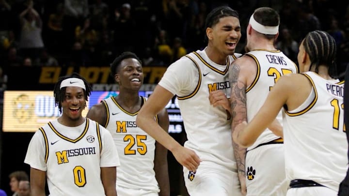 Jan 3, 2026; Columbia, Missouri, USA; Missouri Tigers center Trent Burns (7) celebrates his last-second shot at the end of the first half at Mizzou Arena. Jan 3, 2026; Columbia, Missouri, USA; Missouri Tigers center Trent Burns (7) celebrates his last-second shot at the end of the first half at Mizzou Arena.