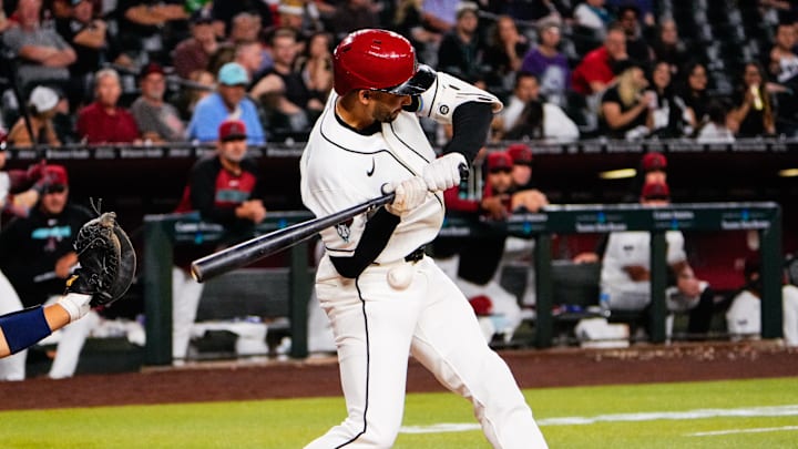 Apr 2, 2026; Phoenix, Arizona, USA; Arizona Diamondbacks outfielder Jordan Lawlar (10) gets hit with a pitch against the Atlanta Braves during the seventh inning at Chase Field. Mandatory Credit: Arianna Grainey-Imagn Images
