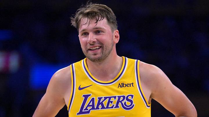 Oct 8, 2026; Los Angeles, California, USA;  Los Angeles Lakers guard Luka Doncic (77) smiles at the free throw line during the second half against the Sacramento Kings at Crypto.com Arena. Mandatory Credit: Jayne Kamin-Oncea-Imagn Images