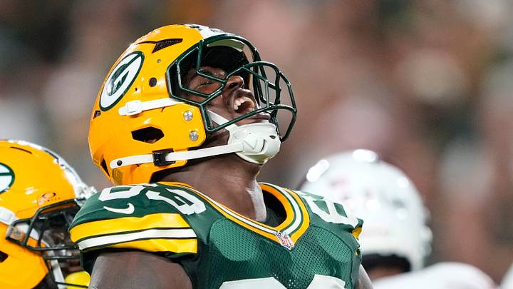 Green Bay Packers defensive tackle Jaden Crumedy (63) celebrates following a play during the third quarter against the Cardinals. Green Bay Packers defensive tackle Jaden Crumedy (63) celebrates following a play during the third quarter against the Cardinals.