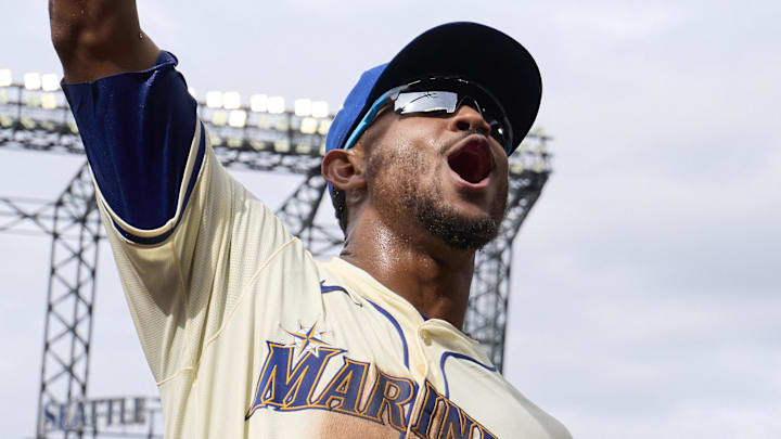 Seattle Mariners center fielder Julio Rodríguez celebrates after the team's win against the Texas Rangers on Aug. 3 at T-Mobile Park.