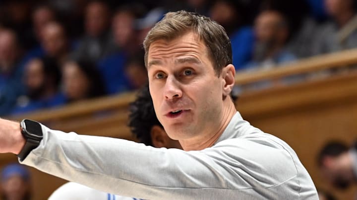 Dec 16, 2025; Durham, North Carolina, USA;  Duke Blue Devils head coach Jon Scheyer gestures to an official during the second half against the Lipscomb Bisons at Cameron Indoor Stadium. The Blue Devils won 97-73.  Mandatory Credit: Rob Kinnan-Imagn Images
