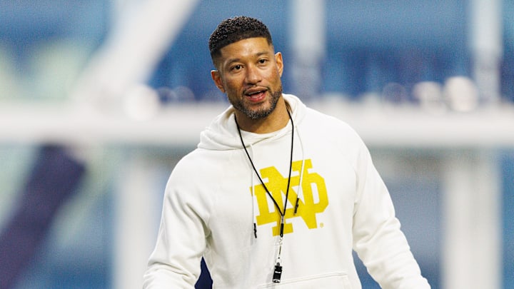 Head coach Marcus Freeman greets his players during a Notre Dame football practice at Irish Athletic Center on Friday, March 20, 2026, in South Bend.