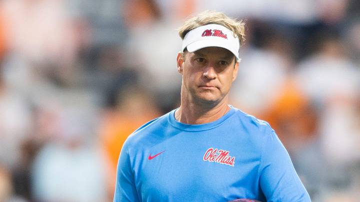 Mississippi Football Coach Lane Kiffin during warmups before a football game. Mississippi Football Coach Lane Kiffin during warmups before a football game.