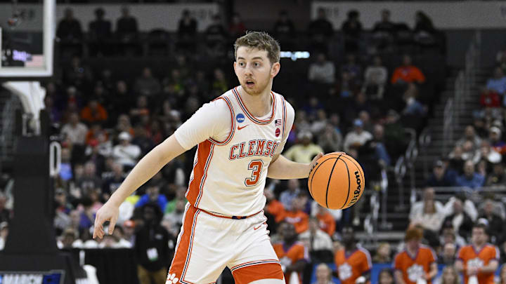 Mar 20, 2025; Providence, RI, USA; Clemson Tigers guard Jake Heidbreder (3) controls the ball against the McNeese State Cowboys during the first half at Amica Mutual Pavilion. 
