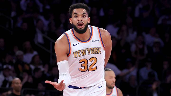 Oct 20, 2026; New York, New York, USA; New York Knicks center Karl-Anthony Towns (32) shoots a three point shot against the Philadelphia 76ers during the fourth quarter at Madison Square Garden. Mandatory Credit: Brad Penner-Imagn Images