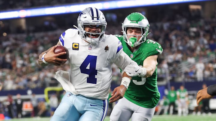 Dallas Cowboys quarterback Dak Prescott (4) runs with the ball in attempt to score a touchdown in the fourth quarter against the Philadelphia Eagles at AT&T Stadium.