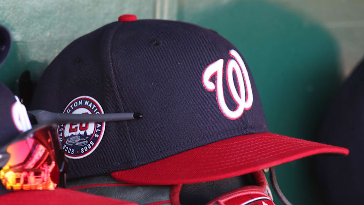Apr 17, 2025; Pittsburgh, Pennsylvania, USA; Washington Nationals hats and gloves in the dugout against the Pittsburgh Pirates during the sixth inning at PNC Park. Apr 17, 2025; Pittsburgh, Pennsylvania, USA; Washington Nationals hats and gloves in the dugout against the Pittsburgh Pirates during the sixth inning at PNC Park.