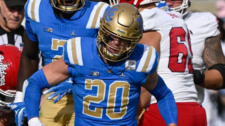 Nov 30, 2024; Pasadena, California, USA; UCLA Bruins linebacker Kain Medrano (20) celebrates sacking Fresno State Bulldogs quarterback Mikey Keene (1) during the section quarter at Rose Bowl. Mandatory Credit: Robert Hanashiro-Imagn Images