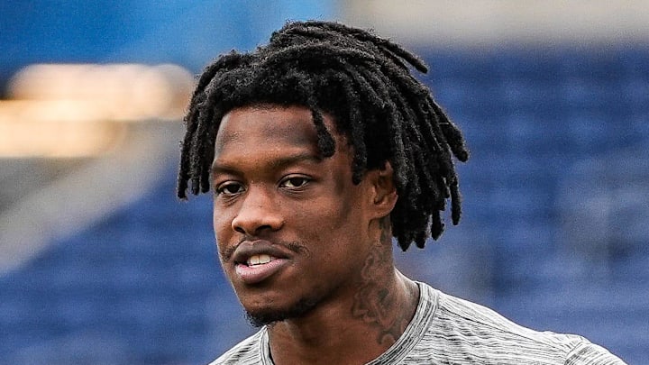 Detroit Lions offensive coordinator John Morton, left, talks to wide receiver Jameson Williams (1) at warm up ahead of the Hall of Fame Game at Tom Benson Hall of Fame Stadium in Canton, Ohio on Thursday, July 31, 2025.