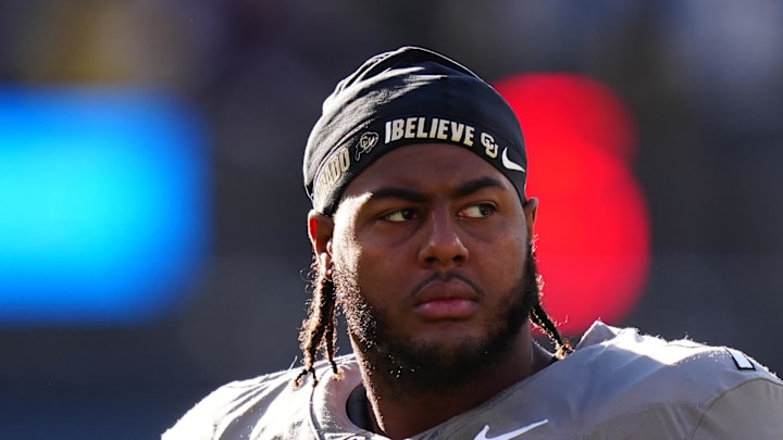 Nov 16, 2024; Boulder, Colorado, USA; Colorado Buffaloes offensive tackle Jordan Seaton (77) looks on before the game against the Utah Utes at Folsom Field.
