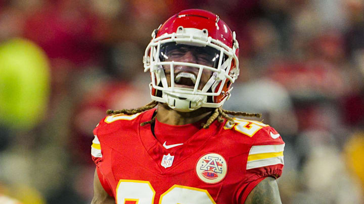 Nov 29, 2024; Kansas City, Missouri, USA; Kansas City Chiefs safety Justin Reid (20) and defensive end George Karlaftis (56) celebrate after a play during the second half against the Las Vegas Raiders at GEHA Field at Arrowhead Stadium. Mandatory Credit: Jay Biggerstaff-Imagn Images
