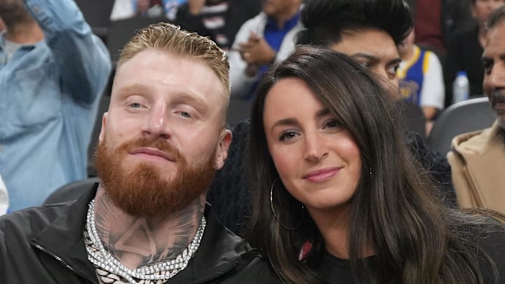 Las Vegas Raiders defensive end Maxx Crosby (left) and wife Rachel Washburn