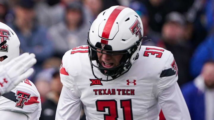 Nov 11, 2023; Lawrence, Kansas, USA; Texas Tech Red Raiders place kicker Gino Garcia celebrates with Nov 11, 2023; Lawrence, Kansas, USA; Texas Tech Red Raiders place kicker Gino Garcia celebrates with