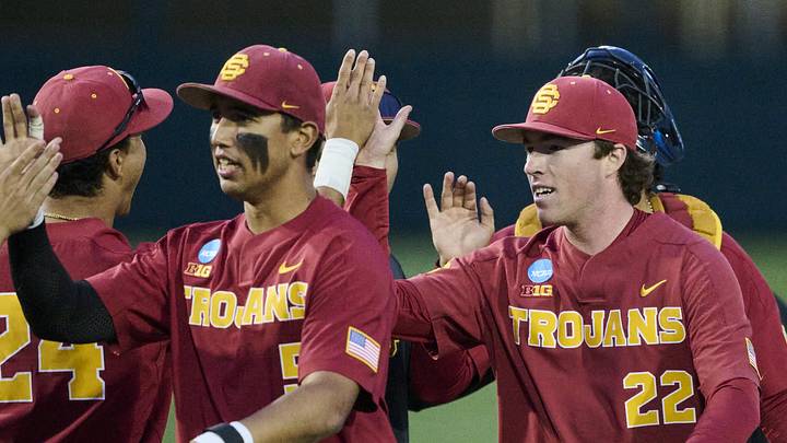 May 31, 2025; Corvallis, OR, USA; USC pitcher Caden Hunter (22) high-fives teammates after a game against Saint Mary's at the NCAA Corvallis Regional at Goss Stadium. Mandatory Credit: Troy Wayrynen-Imagn Images May 31, 2025; Corvallis, OR, USA; USC pitcher Caden Hunter (22) high-fives teammates after a game against Saint Mary's at the NCAA Corvallis Regional at Goss Stadium. Mandatory Credit: Troy Wayrynen-Imagn Images