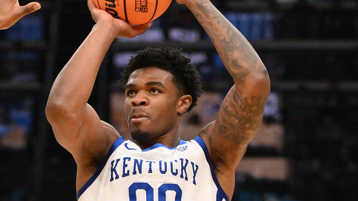 Mar 20, 2026; St. Louis, MO, USA; Kentucky Wildcats guard Otega Oweh (00) shoots a three point shot against Santa Clara Broncos forward Elijah Mahi (8) during the second half of a first round game of the men's 2026 NCAA Tournament at Enterprise Center. Mandatory Credit: Jeff Curry-Imagn Images Mar 20, 2026; St. Louis, MO, USA; Kentucky Wildcats guard Otega Oweh (00) shoots a three point shot against Santa Clara Broncos forward Elijah Mahi (8) during the second half of a first round game of the men's 2026 NCAA Tournament at Enterprise Center. Mandatory Credit: Jeff Curry-Imagn Images