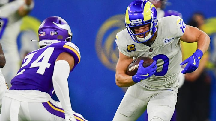 Oct 24, 2024; Inglewood, California, USA; Los Angeles Rams wide receiver Cooper Kupp (10) runs the ball against Minnesota Vikings safety Camryn Bynum (24) during the second half at SoFi Stadium. Mandatory Credit: Gary A. Vasquez-Imagn Images