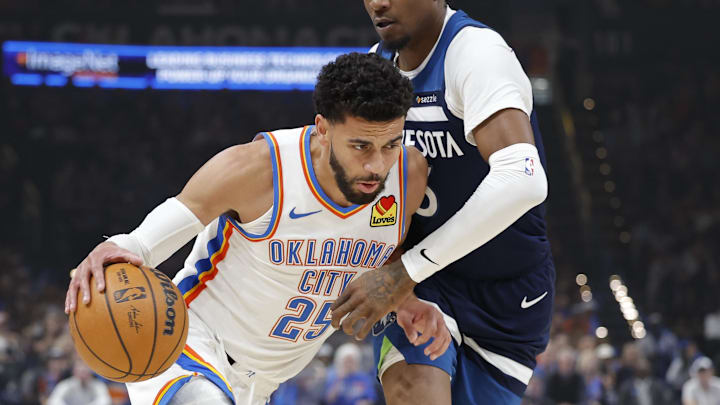 Mar 15, 2026; Oklahoma City, Oklahoma, USA; Oklahoma City Thunder guard Ajay Mitchell (25) drives to the basket against Minnesota Timberwolves guard Bones Hyland (8) during the first half at Paycom Center. Mandatory Credit: Alonzo Adams-Imagn Images Mar 15, 2026; Oklahoma City, Oklahoma, USA; Oklahoma City Thunder guard Ajay Mitchell (25) drives to the basket against Minnesota Timberwolves guard Bones Hyland (8) during the first half at Paycom Center. Mandatory Credit: Alonzo Adams-Imagn Images