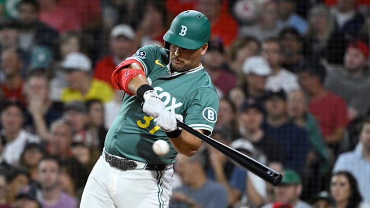 Boston Red Sox first baseman Nathaniel Lowe (37) hits a double against the Detroit Tigers during the second inning at Fenway Park.