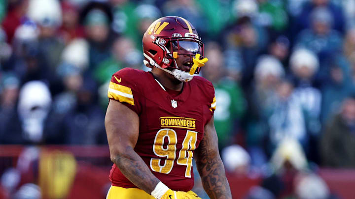 Dec 22, 2024; Landover, Maryland, USA; Washington Commanders defensive tackle Daron Payne (94) celebrates after a play during the third quarter against the Philadelphia Eagles at Northwest Stadium. Mandatory Credit: Peter Casey-Imagn Images