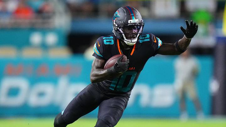 Tyreek Hill runs after the catch. Tyreek Hill runs after the catch.