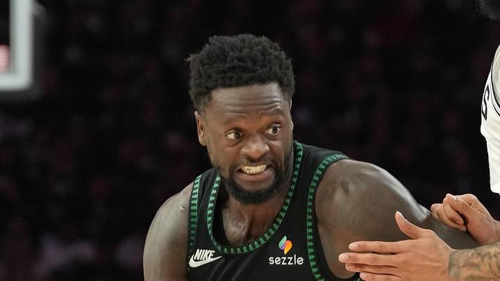 May 15, 2026; Minneapolis, Minnesota, USA; Minnesota Timberwolves forward Julius Randle (30) dribbles the ball past San Antonio Spurs forward Julian Champagnie (30) in the second half during game six of the second round of the 2026 NBA Playoffs at Target Center. Mandatory Credit: Jesse Johnson-Imagn Images