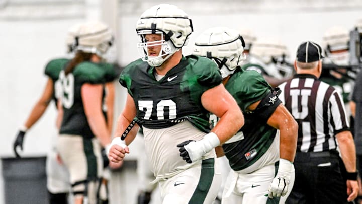 Michigan State's Luke Newman works out during camp on Monday, Aug. 5, 2024, at the indoor practice facility in East Lansing. Michigan State's Luke Newman works out during camp on Monday, Aug. 5, 2024, at the indoor practice facility in East Lansing.