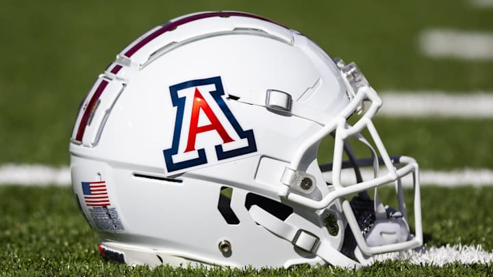 Nov 25, 2022; Tucson, Arizona, USA; Detailed view of an Arizona Wildcats helmet on the field during the Territorial Cup at Arizona Stadium. Mandatory Credit: Mark J. Rebilas-Imagn Images