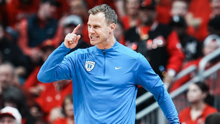 Duke Blue Devils head coach Jon Scheyer yells in the first half as his team fell behind by 10 points in the first half. The Duke Blue Devils rallied from being down nine points at the half to beat Louisville 84-73 Tuesday night at KFC Yum Center January 6, 2026.