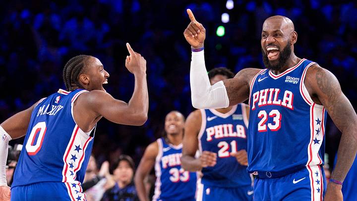 Philadelphia, Pennsylvania, USA; Philadelphia 76ers forward LeBron James (23) and Tyrese Maxey celebrate after a score against the Cleveland Cavaliers during the fourth quarter at Xfinity Mobile Arena on October 22, 2026.